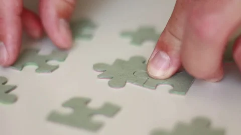 Connecting puzzle pieces Stock Footage 77021771