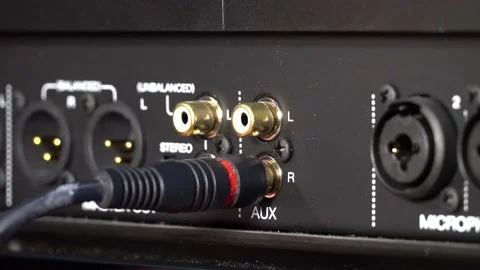 Connecting RCA cables to a DJ mixer Stock Footage 201991427