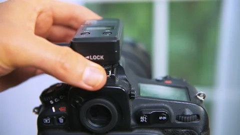 Connecting remote control for wireless shutter release intervalometer Stock Footage 136869412