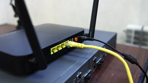 Connecting a router, router to the Internet network via an optical cable - patch Video stock 282983732