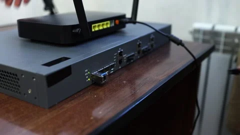 Connecting a router, router to the Internet network via an optical cable - patch Video stock 282983741