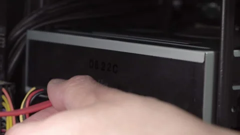 Connecting a sata cable to a computer Stock Footage 310085528