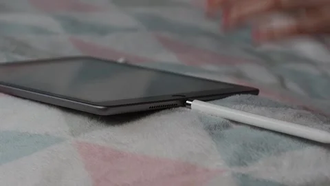 Connecting the tablet to the pencil. Stock Footage 225834831