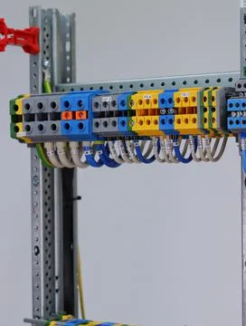 Connecting through-pass electrical terminals in the electrical panel Stock Photos