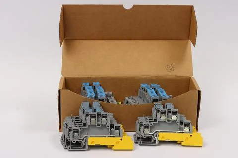 Connecting through-pass electrical terminals in the electrical panel Stock Photos