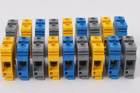 Connecting through-pass electrical terminals in the electrical panel Stock Photos