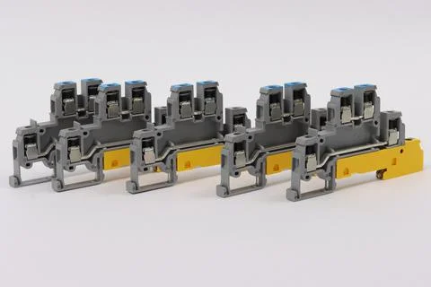 Connecting through-pass electrical terminals in the electrical panel Stock Photos