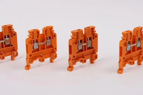 Connecting through-pass electrical terminals in the electrical panel Stock Photos