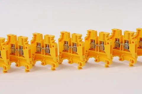 Connecting through-pass electrical terminals in the electrical panel Stock Photos