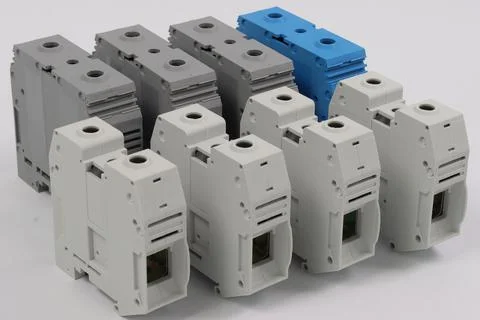 Connecting through-pass electrical terminals in the electrical panel Stock Photos
