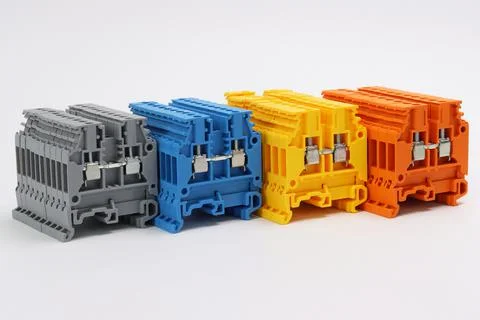 Connecting through-pass electrical terminals in the electrical panel Stock Photos