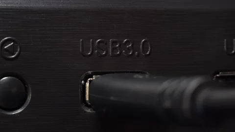 Connecting usb cable to a blue usb 3 port Stock Footage 130483783