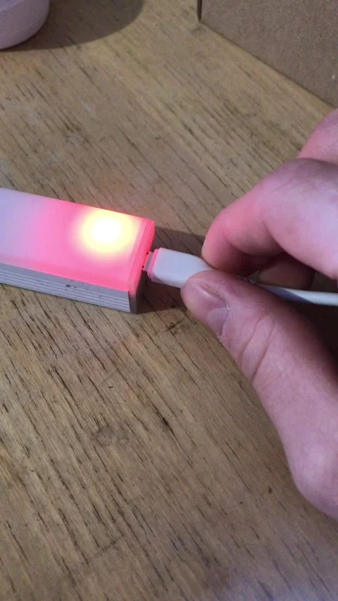 Connecting a USB cable to a compact device Stock Footage 307135367