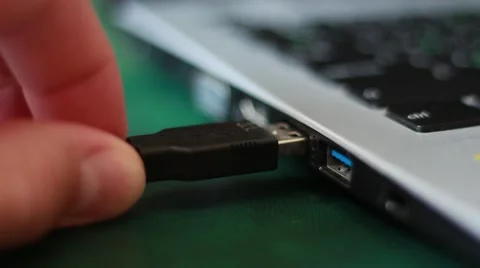 Connecting USB-cable to the computer Stock Footage 64622787