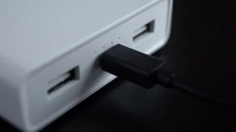 Connecting a usb cable to a power bank Stock Footage 73545332