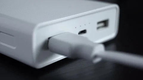 Connecting a usb cable to a power bank Stock Footage 73545382