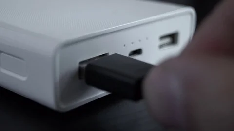 Connecting a usb cable to a power bank Stock Footage 73545392
