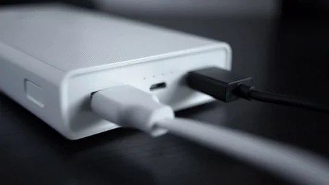 Connecting a usb cable to a power bank Stock Footage 73545448