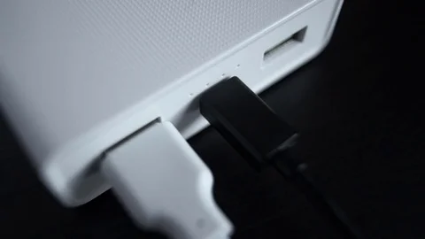 Connecting a usb cable to a power bank Stock Footage 73545453