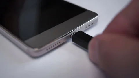 Connecting usb cable to your smartphone Stock Footage 73544849