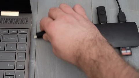 Connecting USB Type C adapter or hub to the laptop. Video stock 123126882