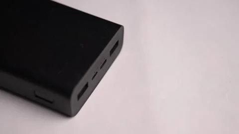 Connecting USB Type A Cable to Power Bank Stock Footage 340610946