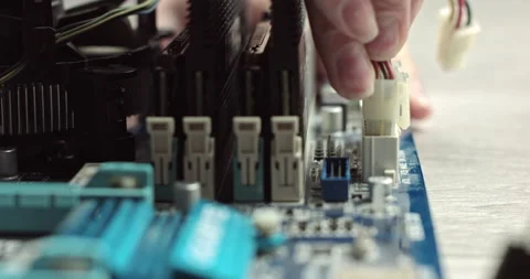 Connecting wires in a computer. Components inside the system unit. Video card Stock Footage 144956137