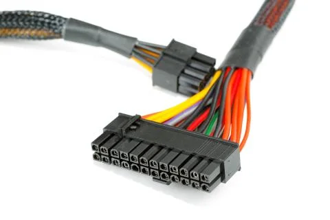 Connecting wires to a computer on a white background Stock Photos