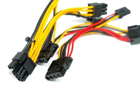 Connecting wires to a computer on a white background Stock Photos