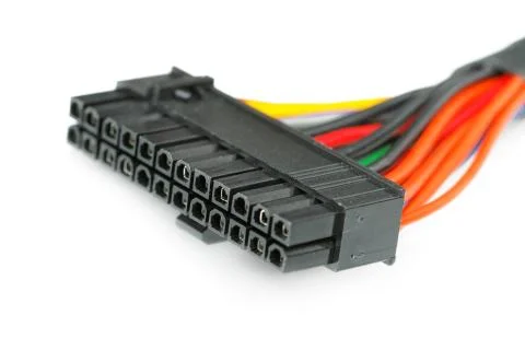 Connecting wires to a computer on a white background Stock Photos