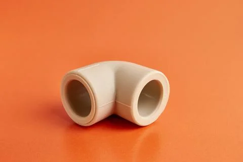 The connection angle of the thermoplastic pipe at an angle of 90 degrees. C.. Stock Photos