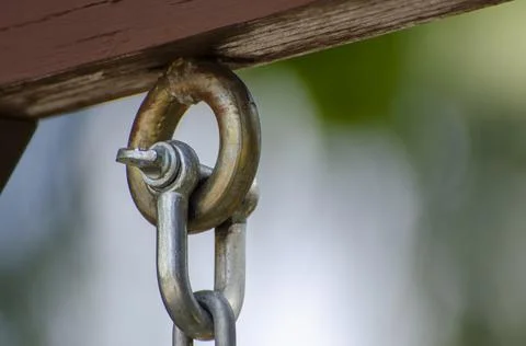 Connection between the chain and the loop for hanging. Stock Photos