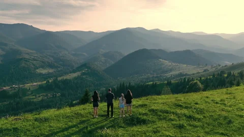 Connection between humans and vast nature expressed through mountain Stock Footage 312742369