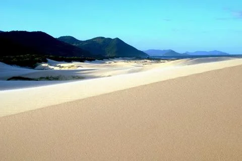 Connection of the dunes with the mountains Stock Photos