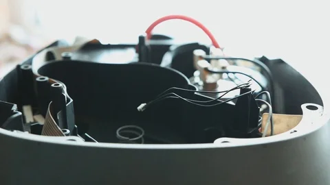 Connection of the electric motor of the coffee maker after repair. Stock Footage 104153951