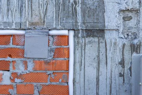 Connection of monolithic structure of building with brickwork of structure is Stock Photos