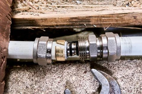 Connection of multilayer pipes using compression fitting during installatio.. 写真素材