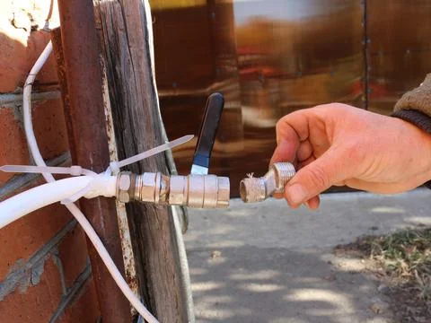 Connection of a part when installing a street crane Stock Photos