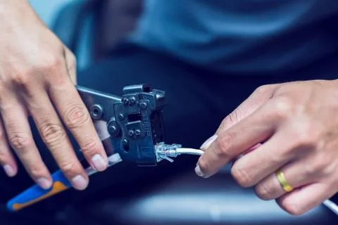 Connection procedure UTP cable, Twisting Cable Tool Twisted Pair Ethernet UTP Stock Photos