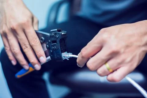 Connection procedure UTP cable, Twisting Cable Tool Twisted Pair Ethernet UTP Stock Photos