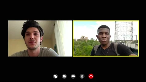 Connection, technology-two university students talk about the online lessons Stock Footage 141914439