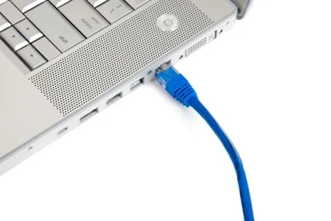 Connectivity - ethernet cable in computer Stock Photos