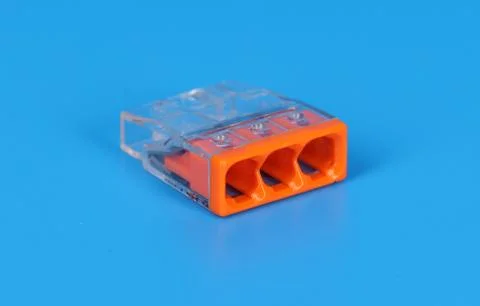 Connector for connecting copper electrical wires. Macro. Soft focus. Stock Photos