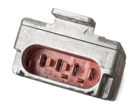 Connector of Metallic car engine control unit with plastic elements on a whit Stock Photos