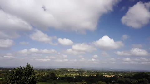Conntryside Scenery Landscape. Time Lapse 4k Motion of White Clouds on Blue S 库存影片 148808761