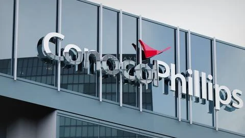 ConocoPhillips Stock data presented on the logo of the office facade editorial Stock Photos