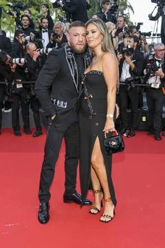  Conor McGregor, Dee Devlin at the premiere of Elvis during the 75th Festi... Stock Photos