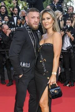 Conor McGregor, Dee Devlin at the premiere of Elvis during the 75th Festi... Stock Photos