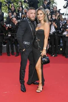  Conor McGregor, Dee Devlin at the premiere of Elvis during the 75th Festi... Stock Photos