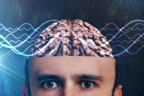 Consciousness and metaphysics concept. Waves go through human head. 스톡 사진
